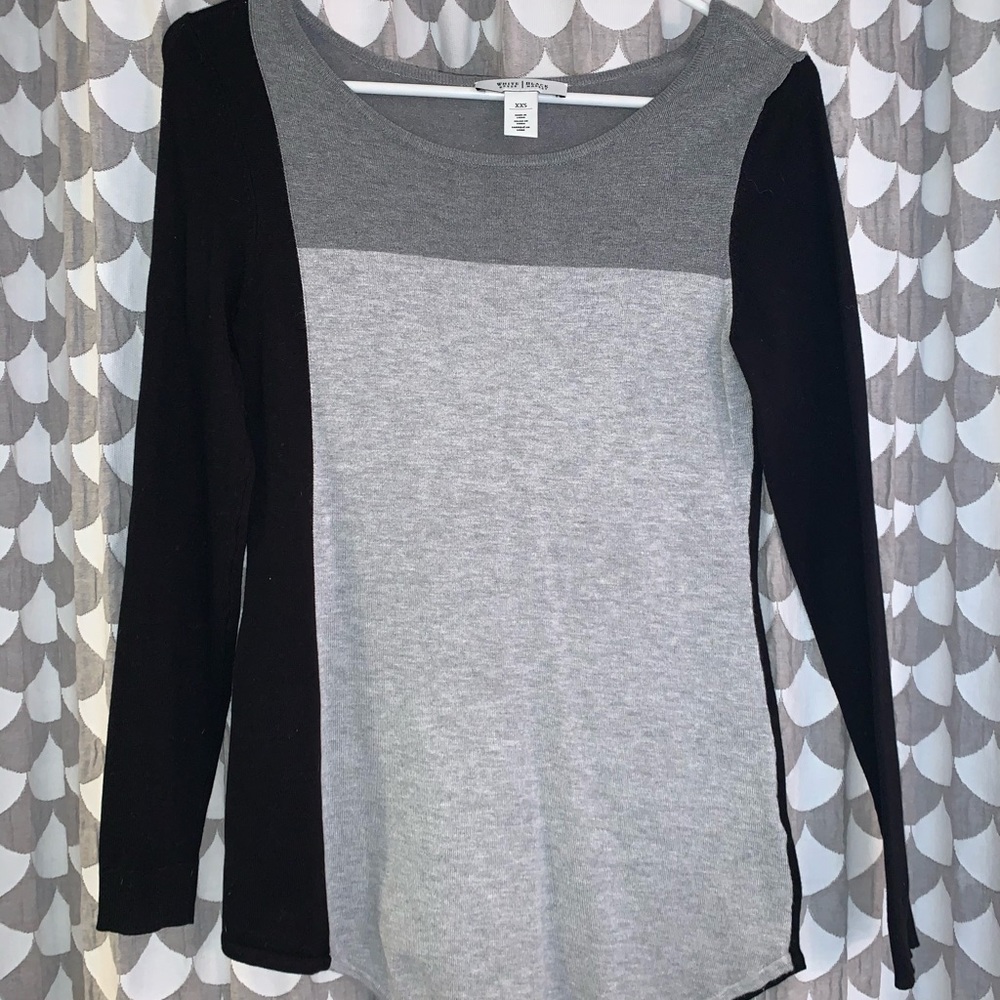 Black and grey blocking with angles bottom seam.